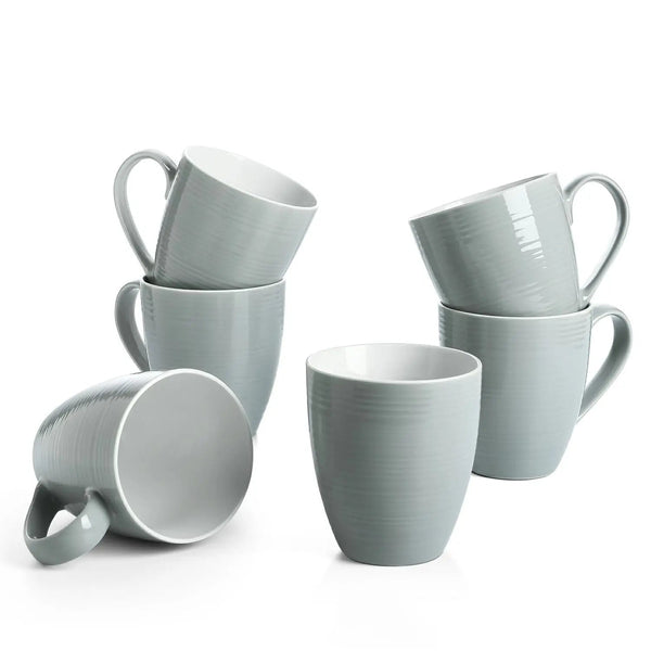 Set of light gray mugs on a white background