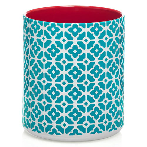 Cylindrical utensil holder with blue floral pattern and red interior on a white background