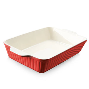 Rectangular ceramic baking dish with red exterior and beige interior on a white background